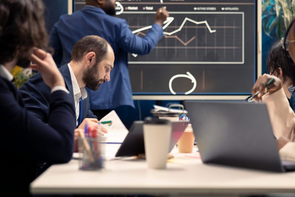 Business team implementing improvements based on customer and employee feedback insights.